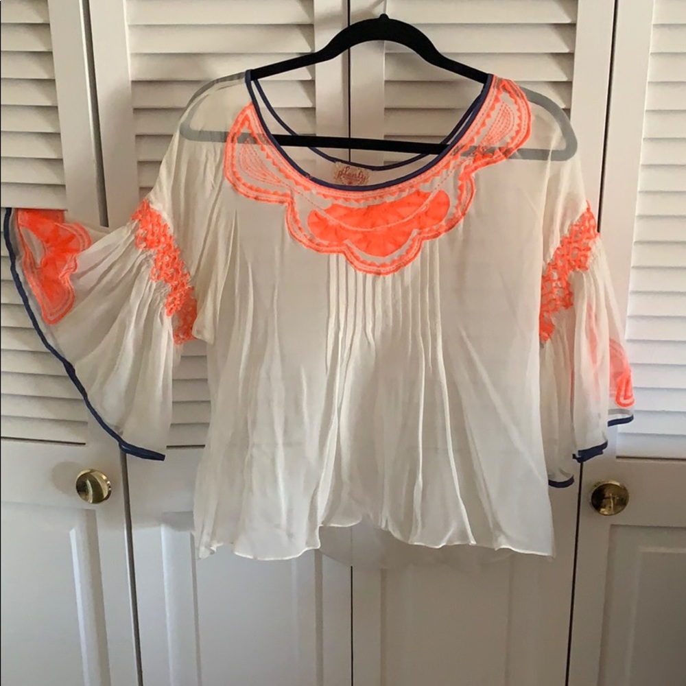Sheer white and orange top